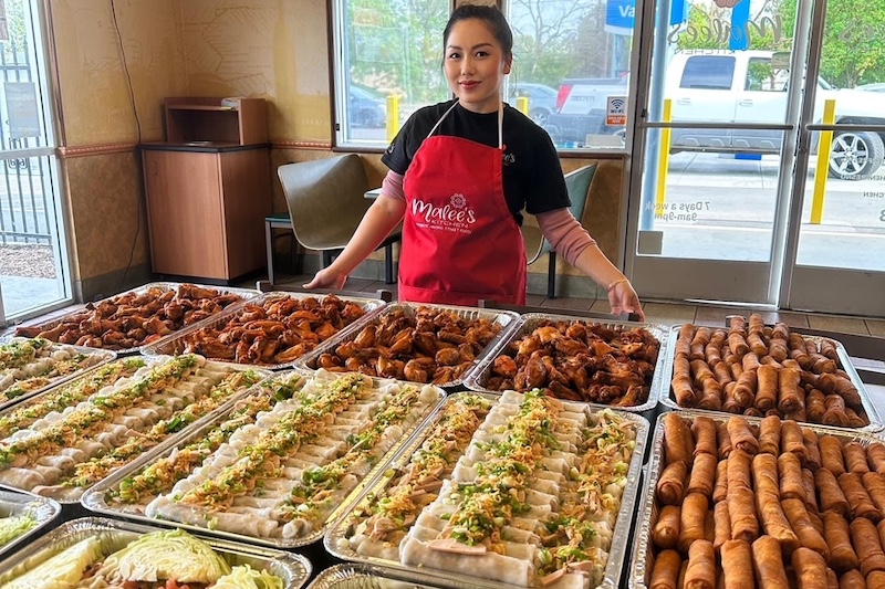 Malee Vang Owner Of Malees Kitchen Shown With Trays And Trays Of Her Amazing Hmong Street Style Cuisine 